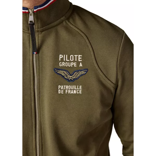 Broderie sur le coeur avec les ailes de l'aviation et l'inscription "Pilote - Patrouille de France".