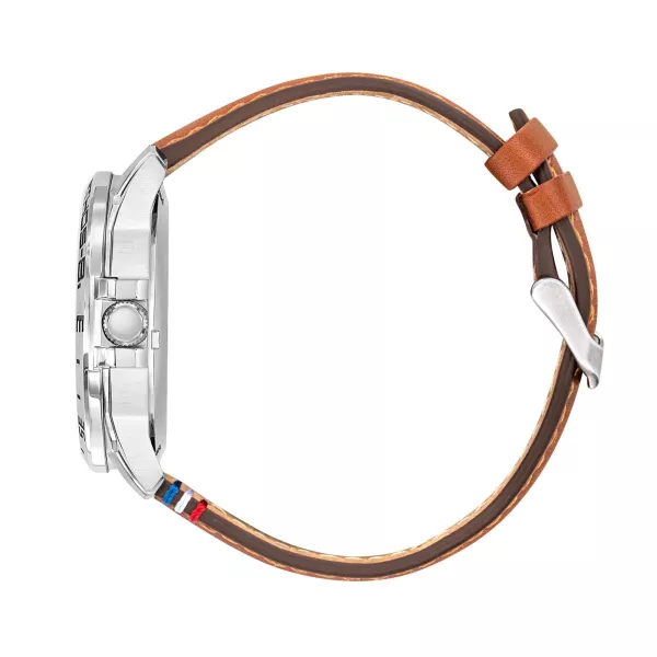 Profil de la montre avec bracelet en cuir marron et boutons en métal.