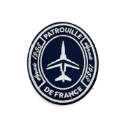Patch sur tissu bleu marine, avec broderie blanche de la Patrouille de France et de l'alpha-jet