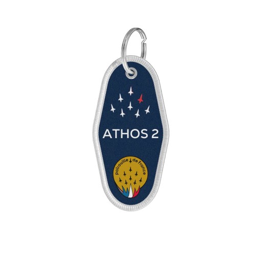 Porte-clé en tissu bleu avec le mot ATHOS 2 écrit en blanc