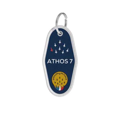 Porte-clé en tissu bleu avec le mot ATHOS 7 écrit en blanc