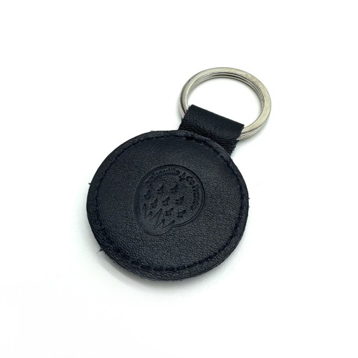 Porte-clé rond en cuir bleu marine, embossé du logo de la Patrouille de France