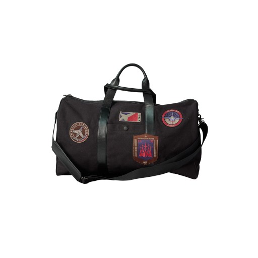 Sac de voyage en tissu et cuir noir