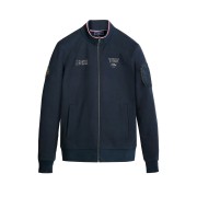 Veste bleu marine avec zip central et détails tricolores sur le col.