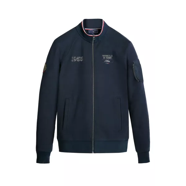 Veste bleu marine avec zip central et détails tricolores sur le col.
