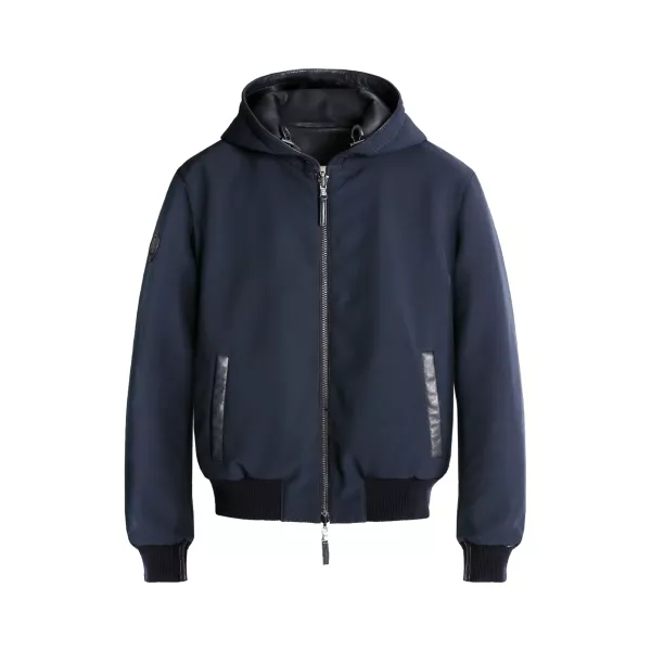 Blouson Reversible avec un côté blue marine en coton et l'autre en cuir noir.