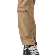 Ouverture zippée sur le bas de la jambe