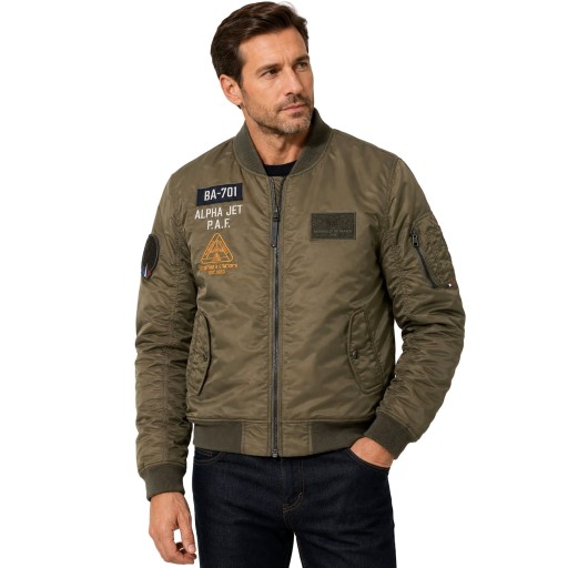 Bombers vert kaki avec inscription "alpha Jet" sur la poitrine. Doublure orange