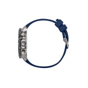 Profil de la montre avec bracelet bleu et boutons en métal.